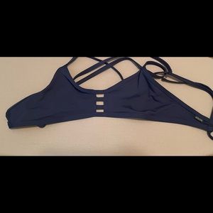 Gently worn Jolyn tomcat swim top. Size large.